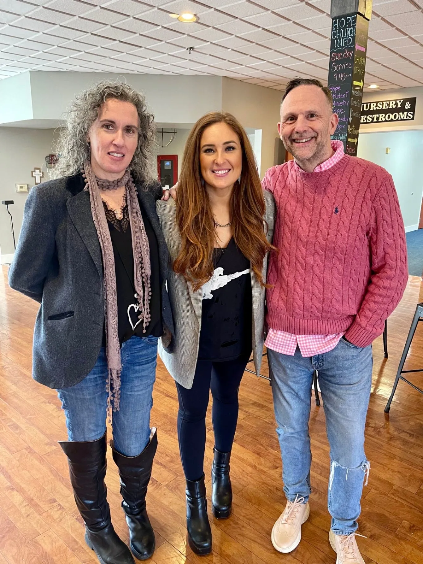 Matt, Buffy, and Kayley together at a church community gathering
