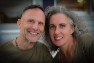 Buffy and Matt Payne smiling together in a close portrait